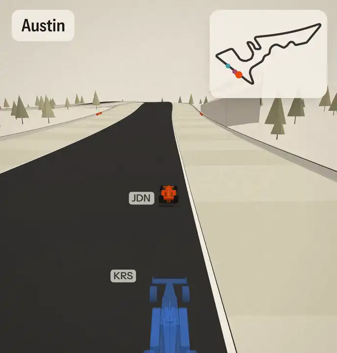 Cars racing each other round Austin in Quali Prix